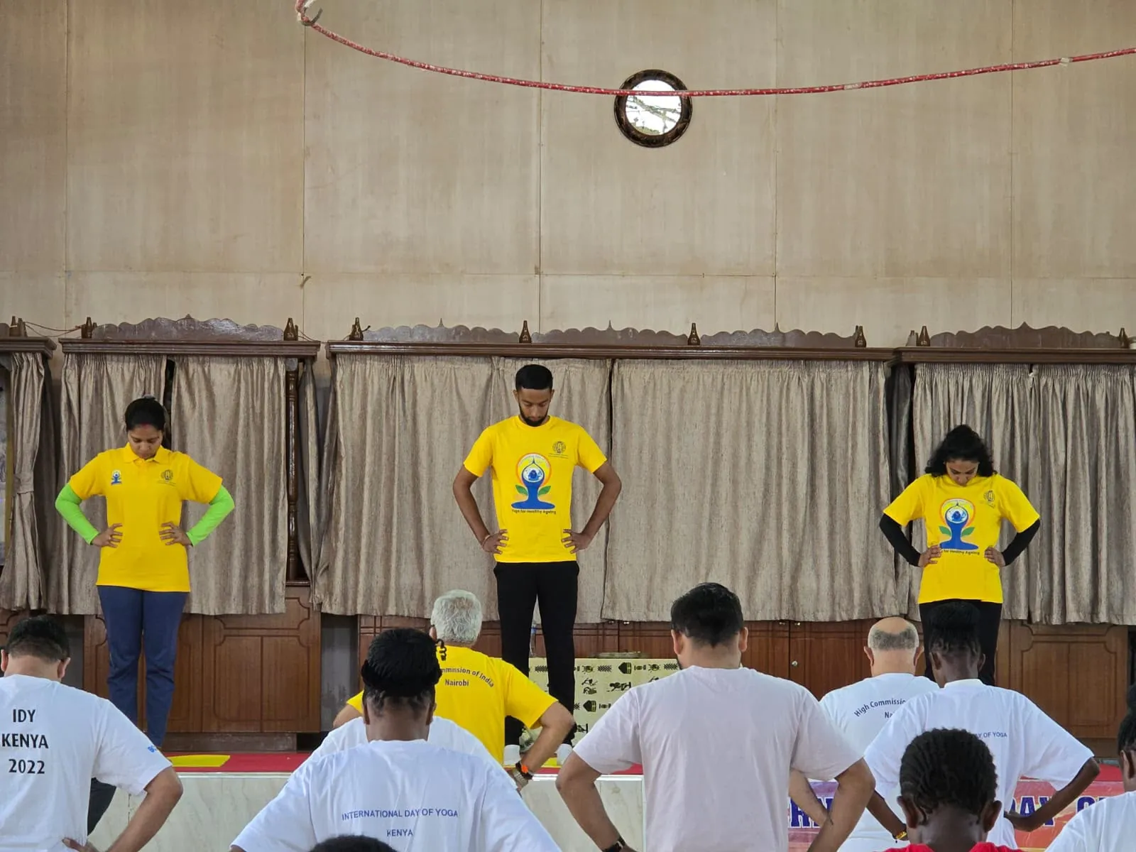 Guided group yoga demonstration at the International Day of Yoga