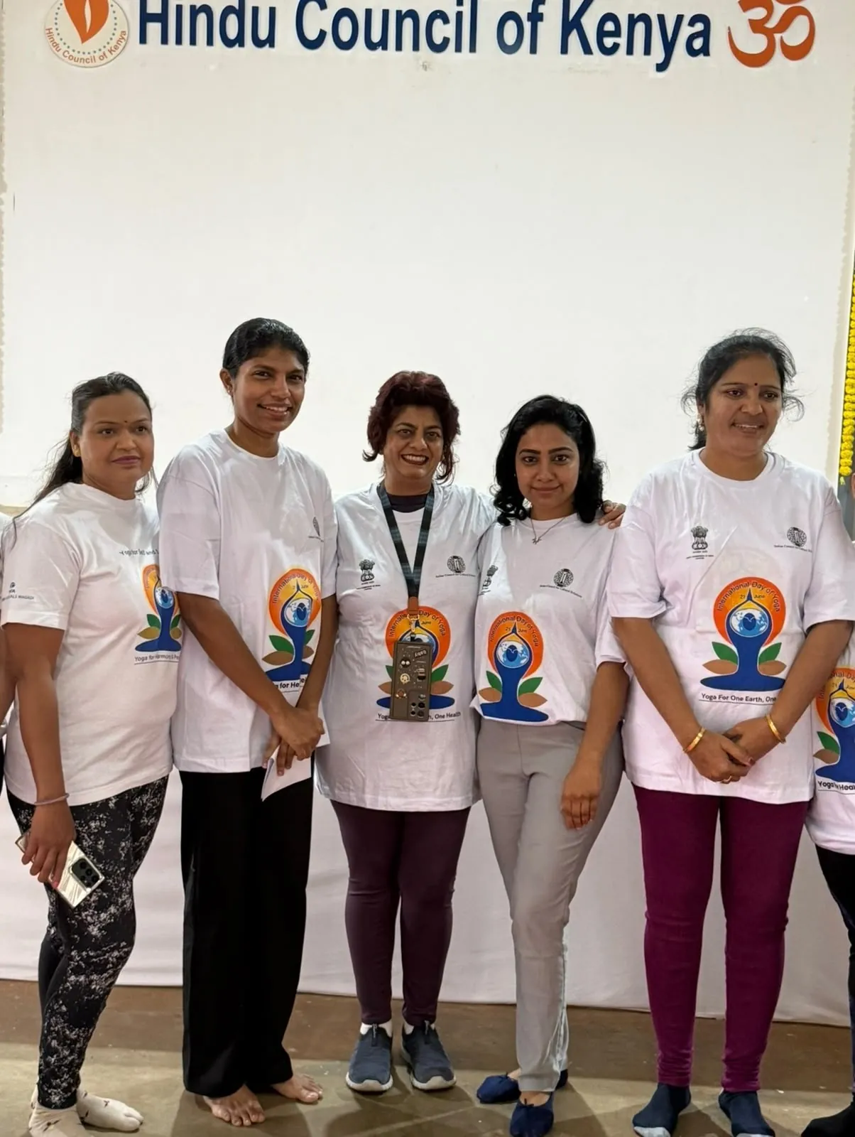 Women supporting the International Day of Yoga celebration